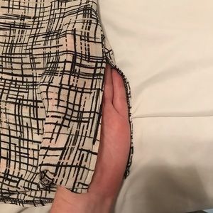 Size L, white shirt with grey, pink and black abstract design lines